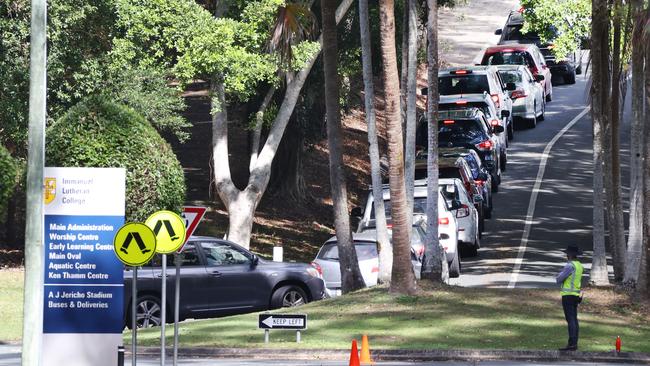 Cars line up for Covid-19 testing at Immanuel Lutheran College at Buderim. Picture: Lachie Millard