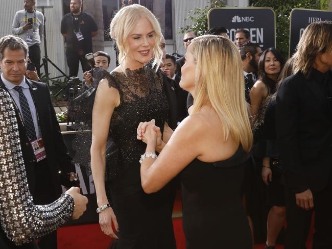 Nicole Kidman and Reese Witherspoon attend The 75th Annual Golden Globe Awards at The Beverly Hilton Hotel on January 7, 2018 in Beverly Hills, California. Picture: Getty