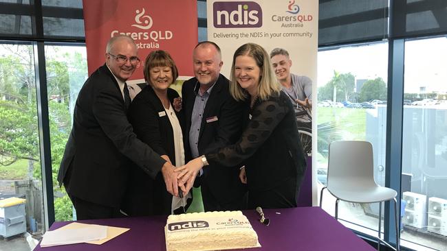 Jim Toohey, left, with then-Carers Queensland chief executive Debra Cottrell, National Disability Insurance Agency Director for Service Delivery David Robinson, and NDIS Local Area Co-ordination community program general manager Jocelyn Wills