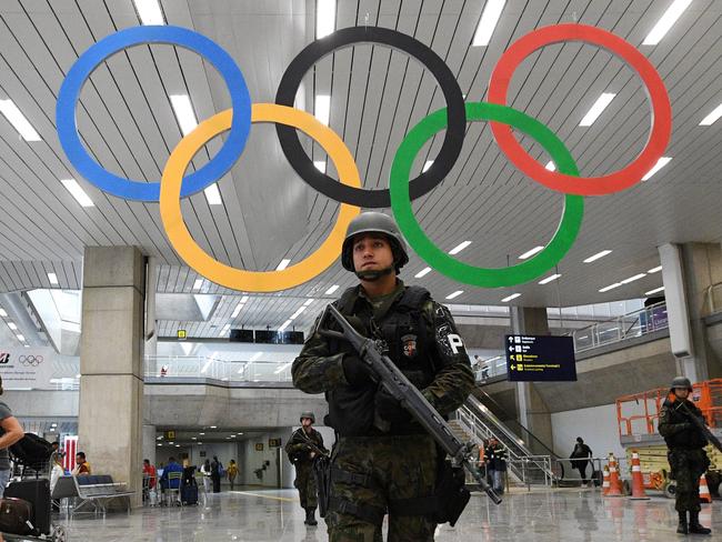 Soldiers patrol Rio’s airport.