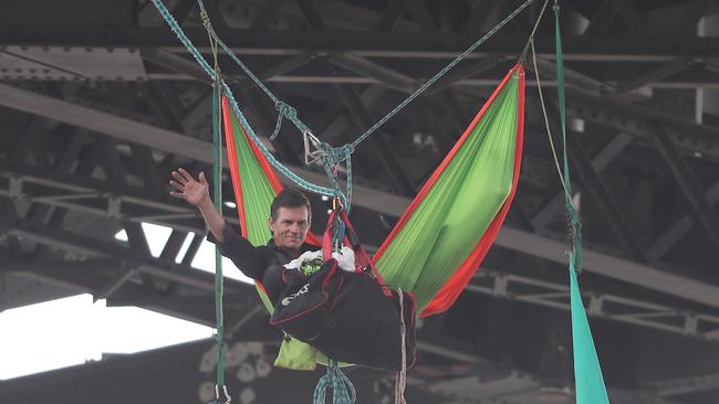 Extinction Rebellion protestor Paul Jukes suspended himself from the Story Bridge on Tuesday. Picture: Peter Wallis