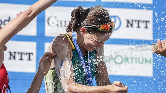 Australian Ashleigh Gentle celebrates before collapsing.