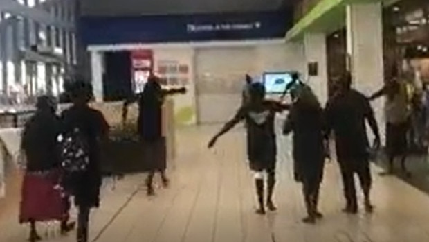 Footage from the knife fight outside Woolworths Darwin