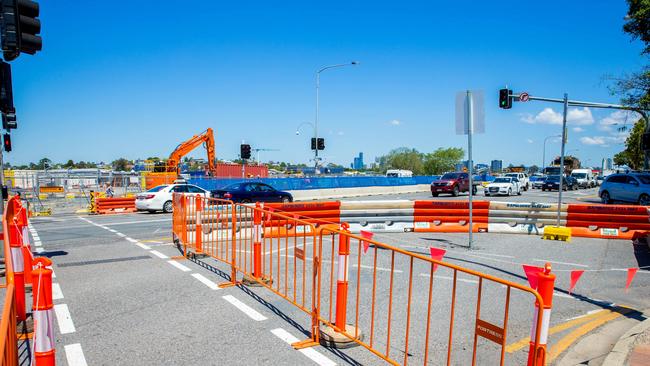 Kingsford Smith Drive construction work around Racecourse Road in October 10, 2018. Years of roadwork have reduced traffic into the street, traders say. (AAP Image/Richard Walker)