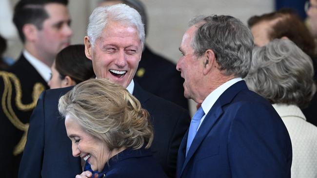 Former US Secretary of State Hillary Clinton and former presidents Bill Clinton and George W. Bush. Picture: AFP