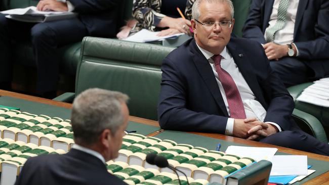 Prime Minister Scott Morrison listens as former Labor leader Bill Shorten asks his first question since the election. Picture: Gary Ramage