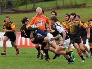 Gympie School Rugby Comp - The wet weather did not stop the contest between rivals James Nash State High School and St Patrick's College. Picture: Troy Jegers