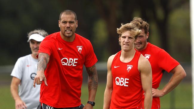 Franklin helps put the young Swans through their paces at training. Photo by Phil Hillyard