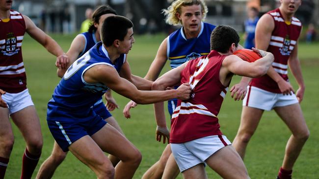 Harry Schoenberg breaks away with the ball, playing for Prince Alfred College in 2018. Picture: Morgan Sette/AAP