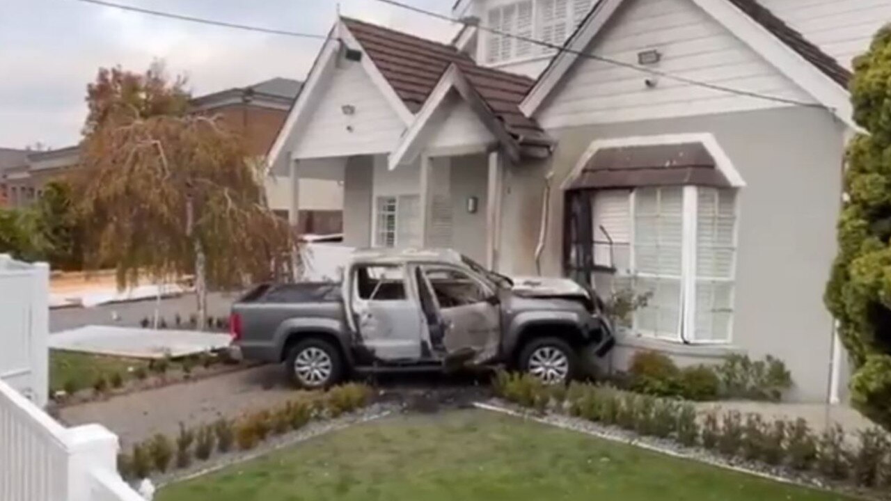 Business, home targeted by burning vehicles in Melbourne | Herald Sun