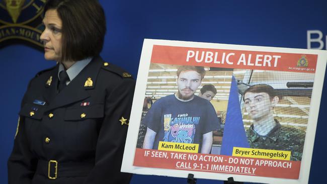 Security camera images recorded in Saskatchewan of Kam McLeod, 19, and Bryer Schmegelsky, 18, are displayed by Royal Canadian Mounted Police Sgt. Janelle Shoihet.