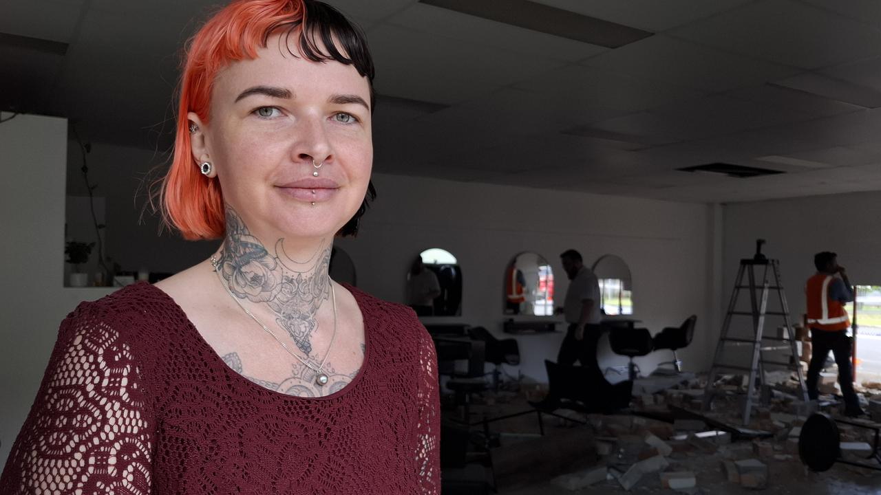 Crimson business owner Jaymi-lee Austin at her damaged hairdressing shop in Coffs Harbour on Monday morning.