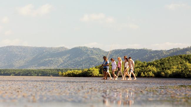 Linc Walker takes visitors to experience traditional hunting along Cooya Beach