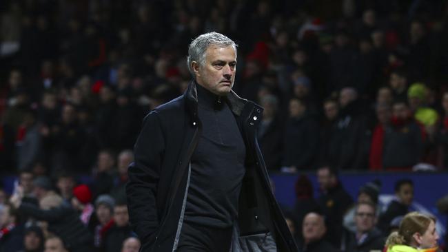 Manchester United head coach Jose Mourinho walks to the dressing room after his side were defeated by Sevilla