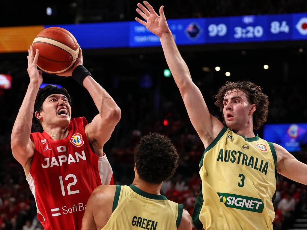 Yuta Watanabe #12 of Japan shoots under pressure from Josh Green #6 and Josh Giddey #3 of Australia. Picture: Getty Images