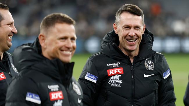 MELBOURNE, AUSTRALIA - MAY 21: (L-R) Hayden Skipworth, Brendon Bolton, Craig McRae and Justin Leppitsch of the Magpies celebrate during the 2023 AFL Round 10 match between the Carlton Blues and the Collingwood Magpies at the Melbourne Cricket Ground on May 21, 2023 in Melbourne, Australia. (Photo by Michael Willson/AFL Photos via Getty Images)