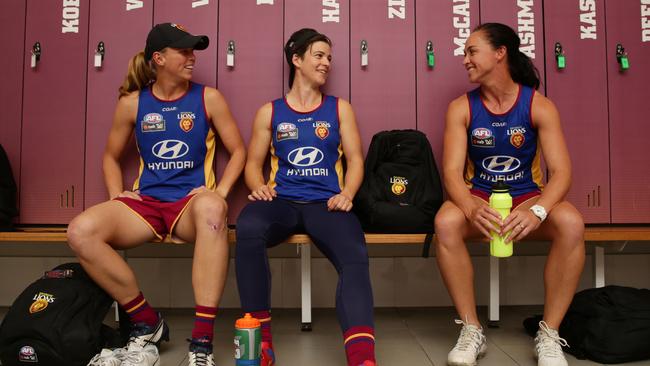 Kate Lutkins, Sam Virgo and Leah Kaslar relax in the locker rooms before training. Pic Peter Wallis