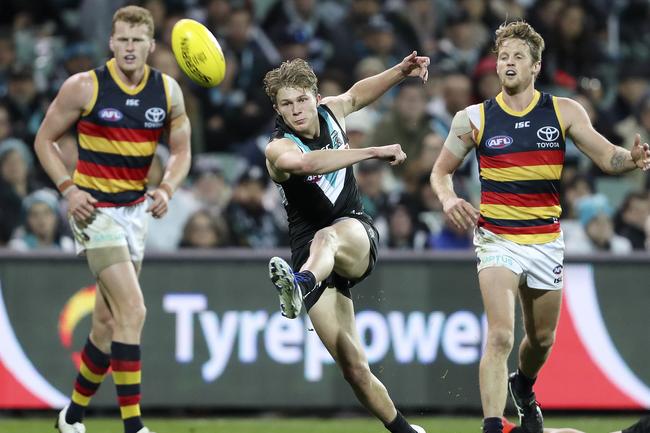 Port Adelaide’s young gun Xavier Duursma advances the football against the Crows at Adelaide Oval. Picture Sarah Reed