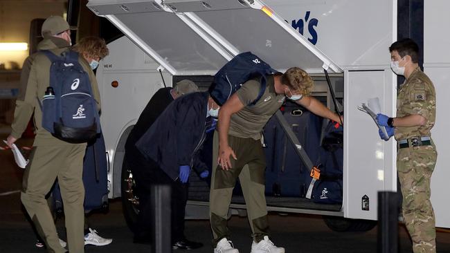 Wallabies players drop off their luggage before boarding a bus after arriving in Christchurch last week. Picture: AFP