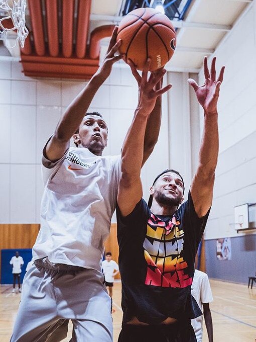 Ben Simmons with Melbourne youth at a Helping Hoops event. Picture: Adam McKay/Helping Hoops