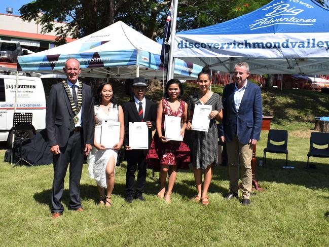 New Australian Citizens Afrel Newman, John Libiran, Rowena Innes and Jinapat Munro. Photo: Adam Daunt