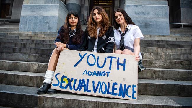 Adelaide High School students Rira, Sophia and Martha, are part of the school’s Call4Action group helping co-ordinate the national walk out. Picture: Tom Huntley