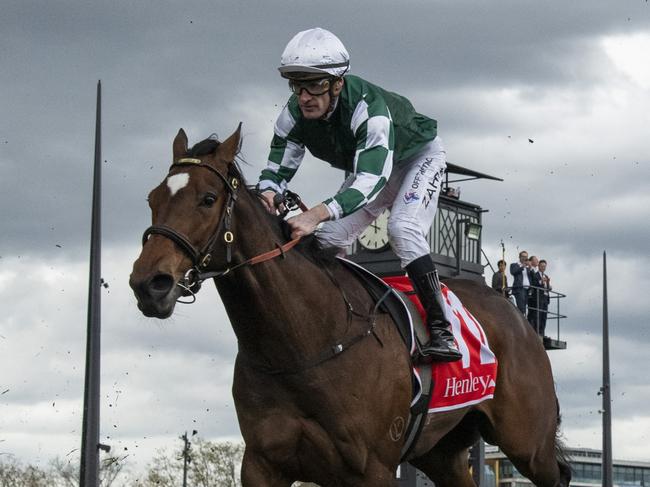 MELBOURNE, AUSTRALIA - SEPTEMBER 21: Mark Zahra riding  Place Du Carrousel during unpaced finish in Race 8, the Henley Homes Underwood Stakes - Betting Odds during Melbourne Racing at Caulfield Racecourse on September 21, 2024 in Melbourne, Australia. (Photo by Vince Caligiuri/Getty Images)