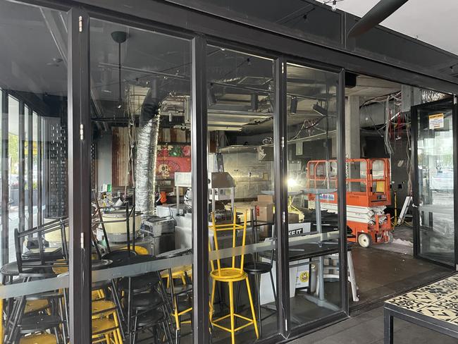 The stripped interior of the Townsville CBD Guzman y Gomez store. Picture: Leighton Smith.