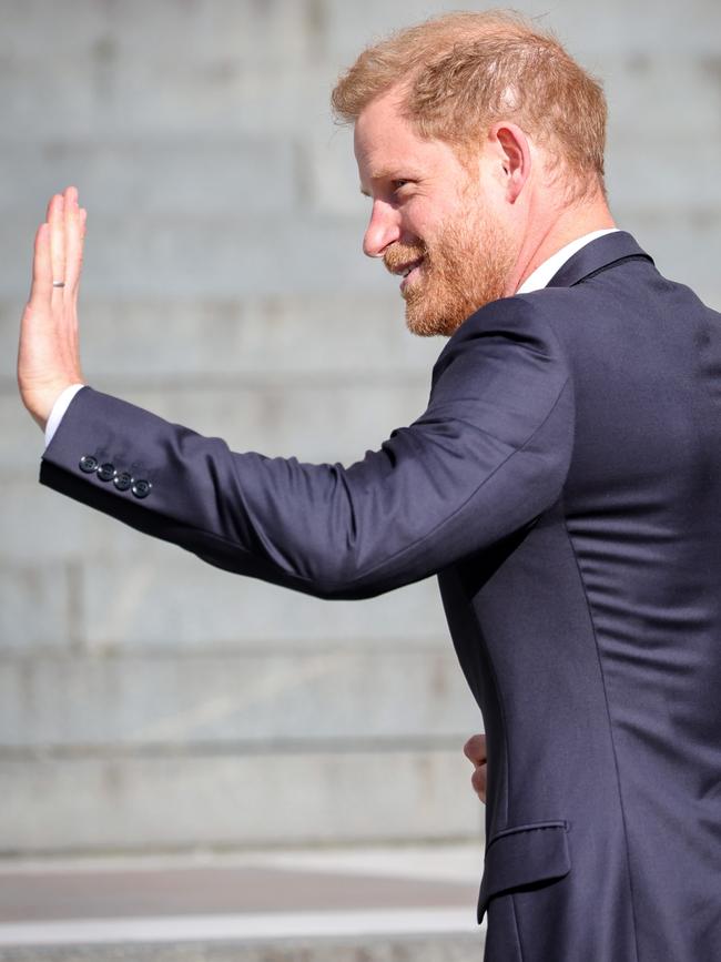 ... But was all smiles outside. Picture: Chris Jackson/Getty Images for Invictus Games Foundation