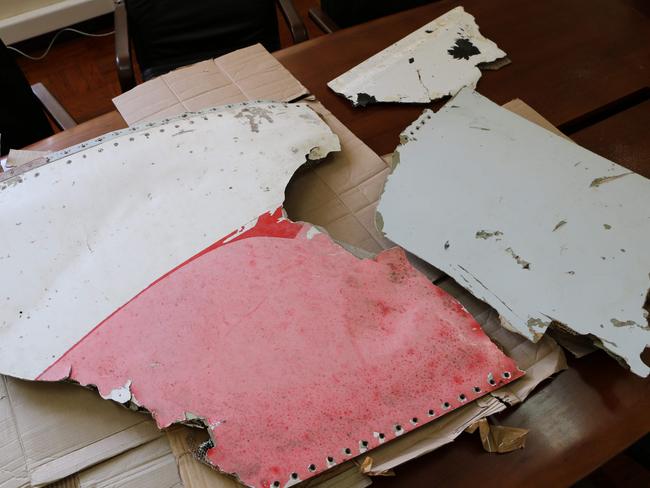 Three pieces of aircraft wreckage found off the east African coast of Mozambique are displayed at Mozambique's Civil Aviation Institute (IACM) in Maputo. Picture: AFP