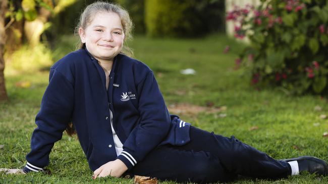 Claire Mibus, 11, from Riverstone, who attends John Palmer Public School, in her school uniform with pants. Picture: Justin Lloyd