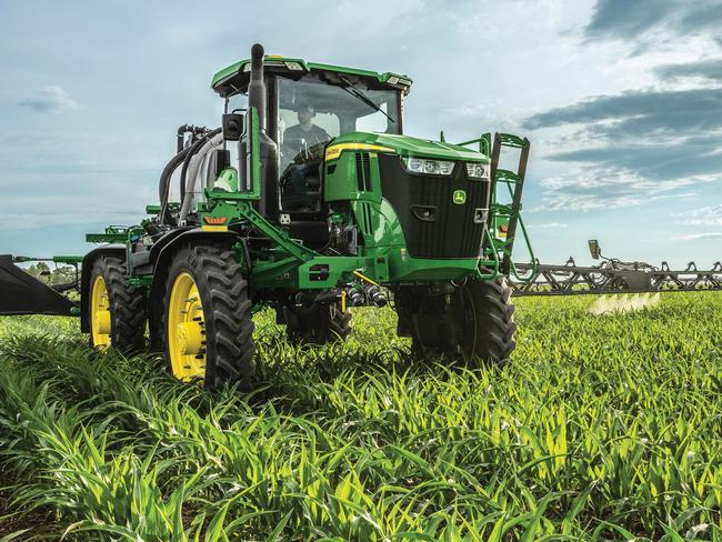 John Deere precision sprayer and harvester.