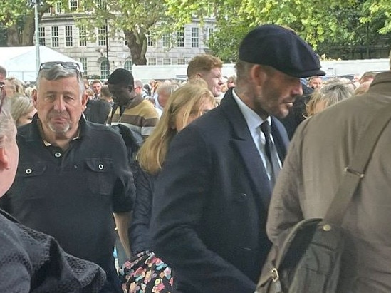 David Beckham in the queue to visit Queen Elizabeth lying in state at Windsor Castle.