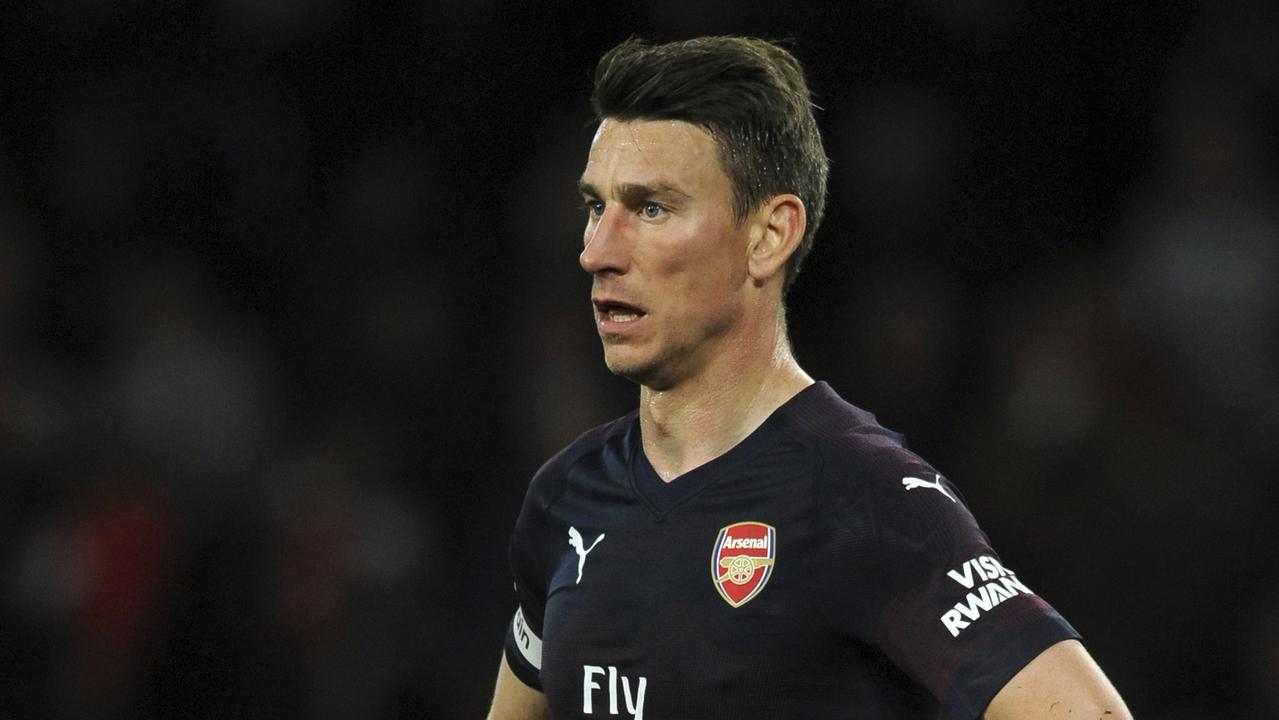 Laurent Koscielny is ready for a legal showdown with Arsenal after being told to take a 50 per cent pay cut.