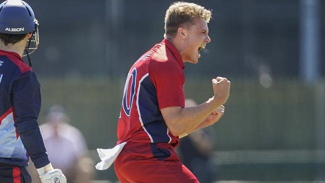 Premier Cricket: Melbourne v Dandenong. Jack Prestwidge bowling for Melbourne celebrates the wicket of Brett Forsyth. Picture: Valeriu Campan