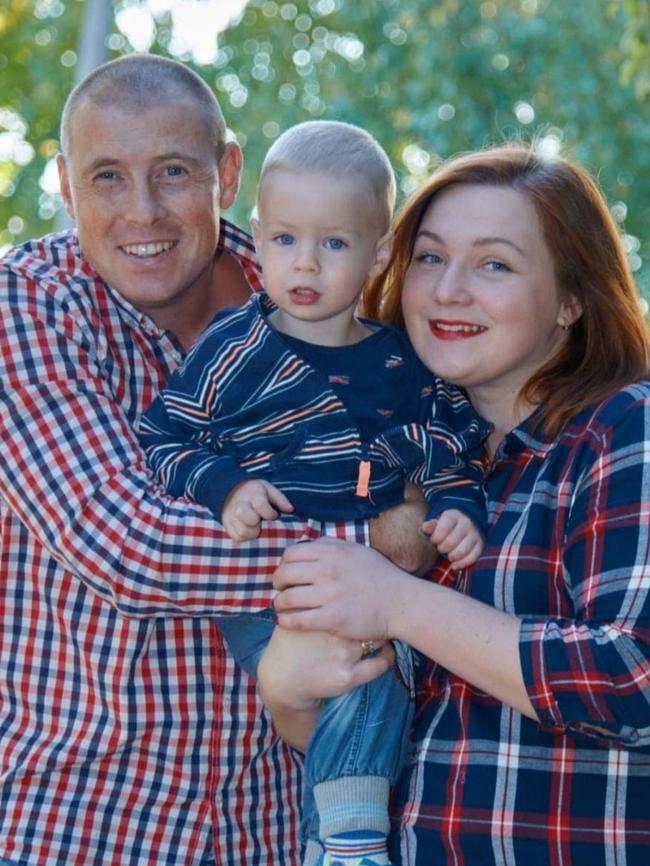 Svitlana Soldatova with Vitaly, who was killed fighting a rearguard action in Volnovakha, and their son. Source: Supplied