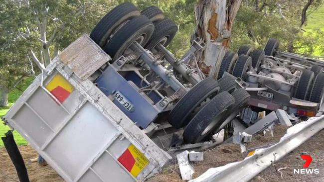 The truck rolled over a guard rail. Picture: 7 News