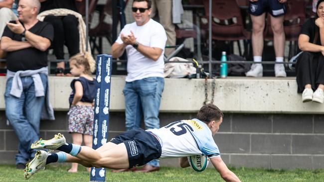 Mitch Woods scoring one of the Waratahs 13 tries.