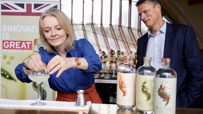 Truss prepares a cocktail during a trip to Australia. Picture: Supplied