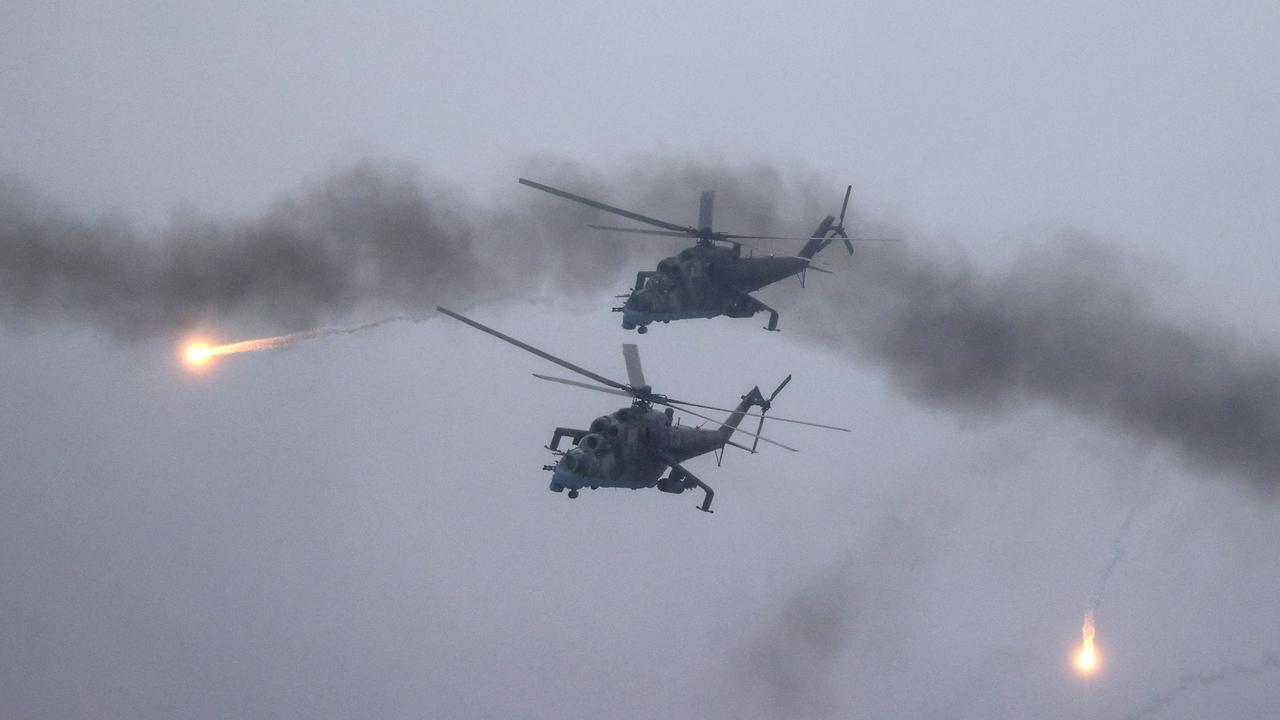 Helicopters fire during joint exercises of the armed forces of Russia and Belarus as part of an inspection of the Union State's Response Force, at a firing range near a town of Osipovichi outside Minsk. Picture: Maxim GUCHEK / AFP