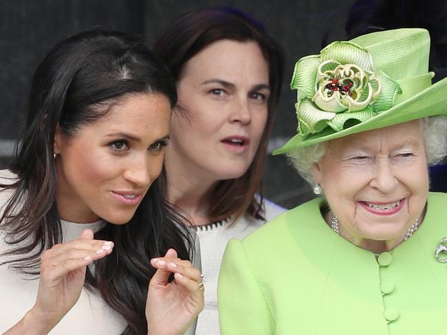 Queen Elizabeth II and the Duchess of Sussex at the opening of the new Mersey Gateway Bridge, in Widnes, Cheshire. In the background is Samantha Cohen, the Queen's former Assistant Private Secretary who is now working with the Duchess. (Photo by Danny Lawson/PA Images via Getty Images)