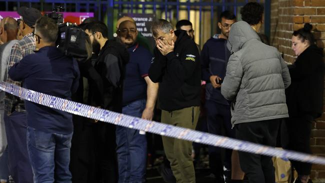 Crowds of concerned people gathered outside Liverpool Hospital where the religious leader was taken. Picture: NCA NewsWire / Jonathan Ng