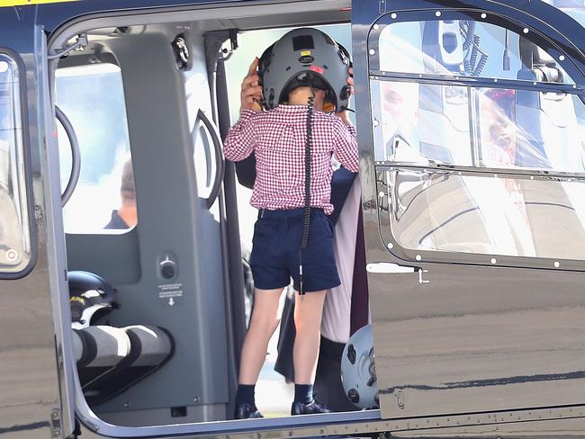 Prince George tries on a helmet. Picture: Chris Jackson/Getty Images