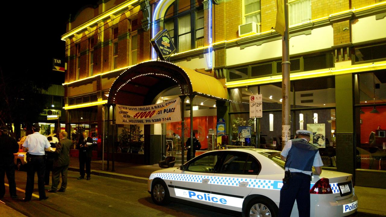 Police outside the Brunswick Club where gangster Lewis Moran was shot and murdered in 2004.