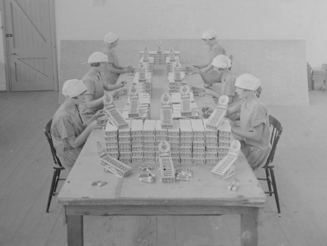 Women packing Life Savers into boxes at MacRobertson’s chocolate factory. Picture: State Library of Victoria.