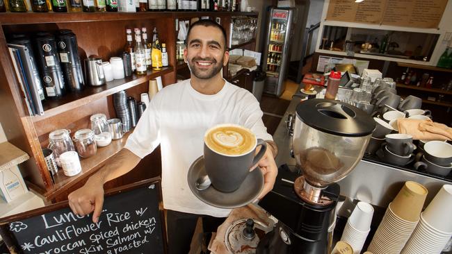 Grabbing a takeaway coffee will now require check-in. Picture: David Geraghty