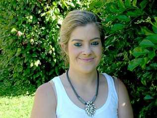 Taylor Davies at her Wackford St homes welcomes further flood mitigation funding. Picture: Jann Houley