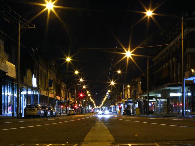 Sydney Road in Brunswick was deserted after 8pm yesterday. Picture: Getty Images