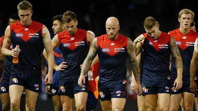 Nathan Jones leads the team off the ground. Picture: George Salpigtidis