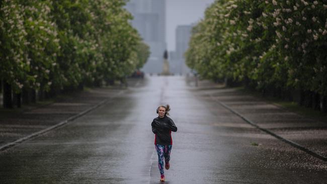 A runner Joggers defies the rain at Greenwich Park in London. Picture: Getty Images